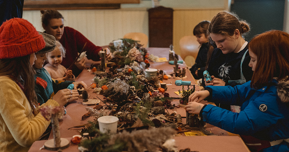 children at the nature craft table